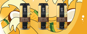 Three cans of 'Creamy Colada' ale on a decorative background with leaves and flowers.